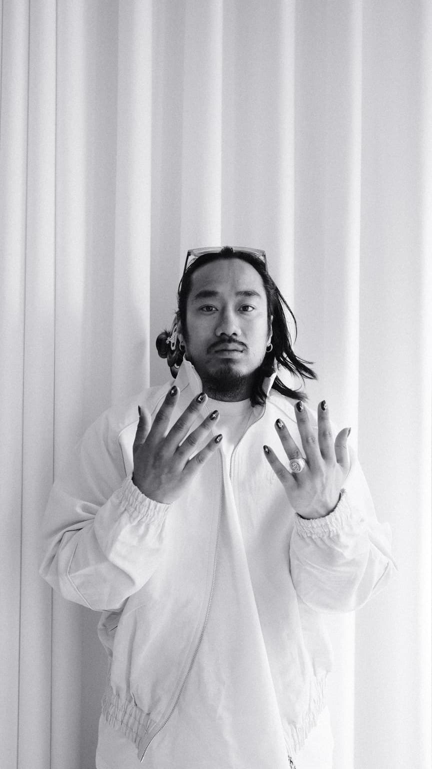 DUKEZ black white hands raised ritual